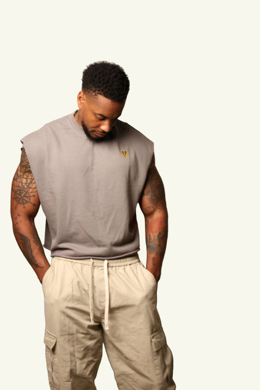 Legacy Crest Cropped Muscle Tee – Oversized Sleeveless Graphic Shirt
